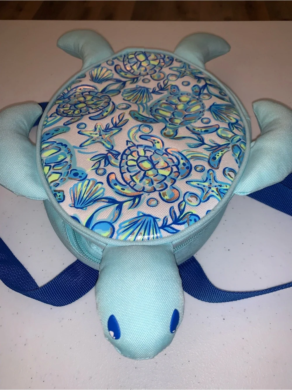 Sea turtle-shaped mini backpack bag featuring a shiny starfish shells & turtles